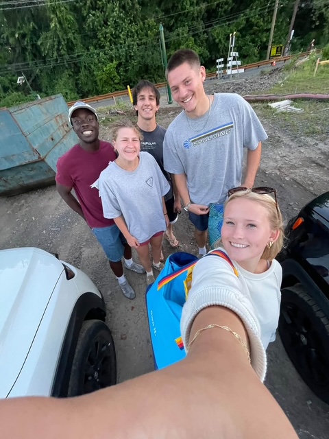 The Mission 1812 team smiling together before a Friday outreach